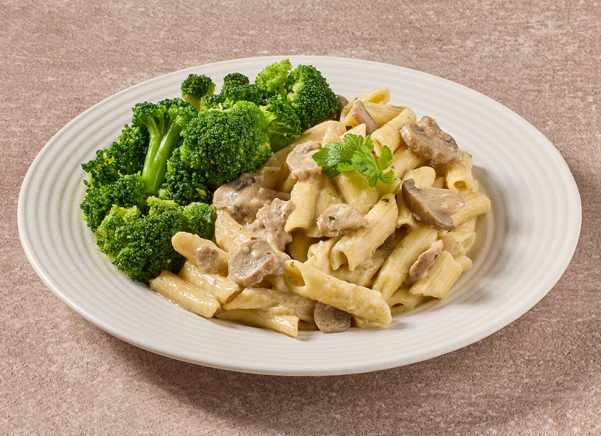 Penne met champignonragout met broccoliroosjes (vegetarisch)
