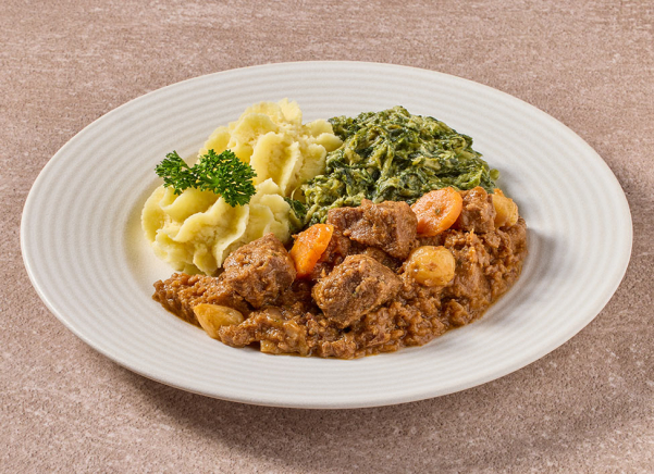 Hollands stoofpotje met andijvie à la crème en aardappelpuree