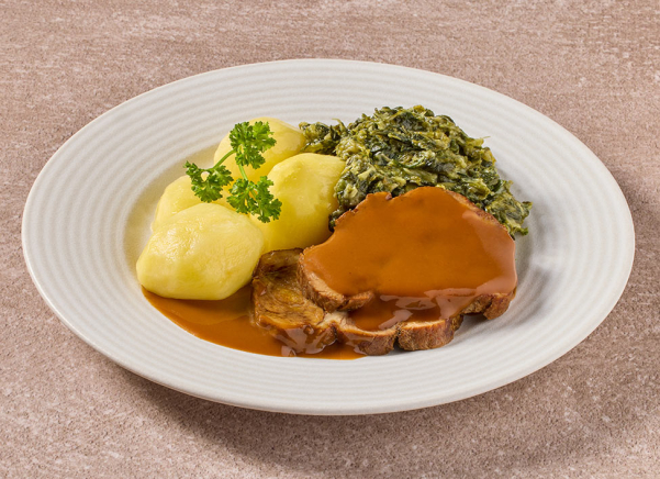Varkensrollade in jus met andijvie à la crème en gekookte aardappelen (kleine eiwitrijke maaltijd)