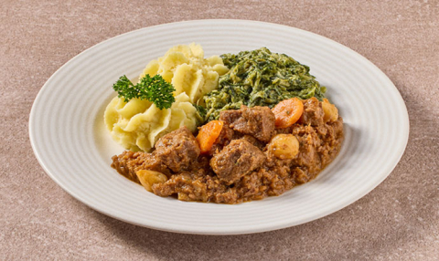 Hollands stoofpotje met andijvie à la crème en aardappelpuree