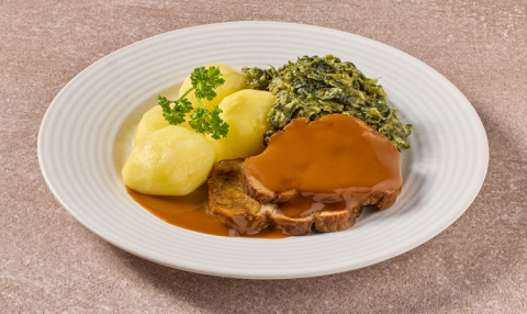 Varkensrollade in jus met andijvie à la crème en gekookte aardappelen (kleine eiwitrijke maaltijd)